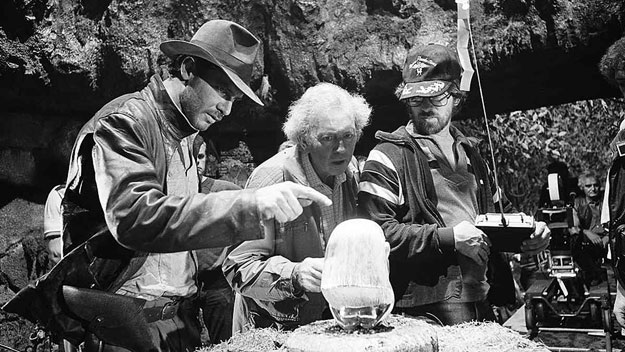 Douglas Slocombe, Harrison Ford & Steven Spielberg on the set of Raiders of the Lost Ark
