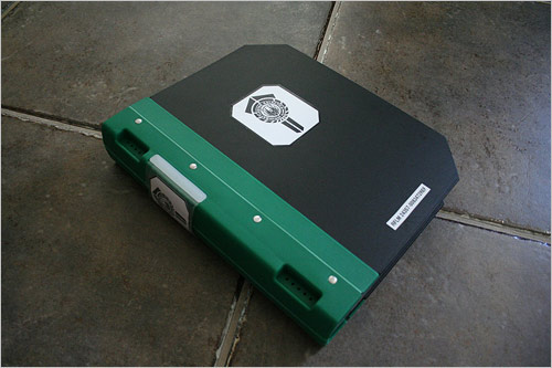 Bill Hunt's custom packaging based on prop binders from the show.